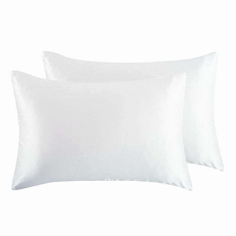 Satin pillowcase on a bed, showing the smooth surface