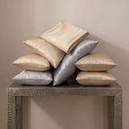 Champagne silk pillowcase on a bed